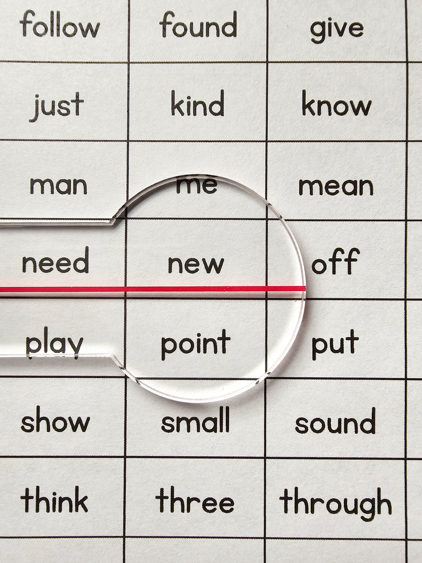 Reading Overlay - Clear Underliner magnifying words on a learning worksheet for better reading focus.