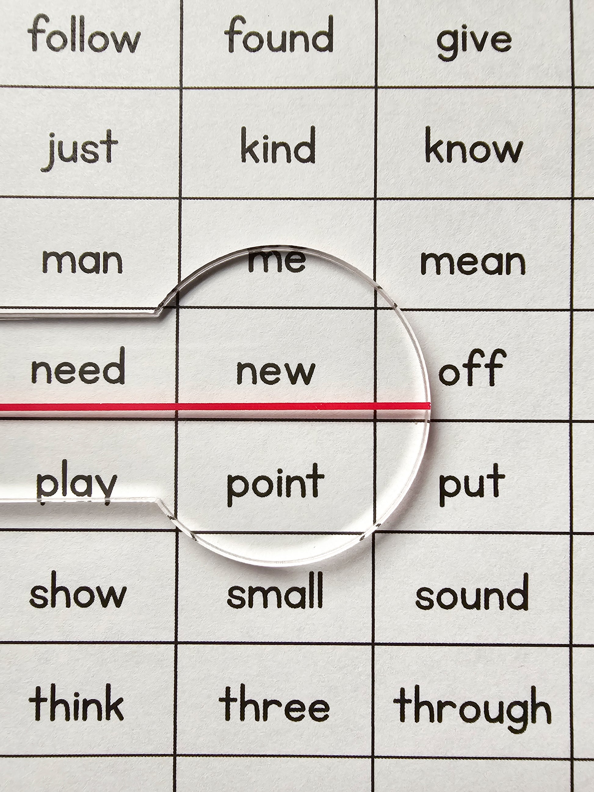 Reading Overlay - Clear Underliner magnifying words on a learning worksheet for better reading focus.