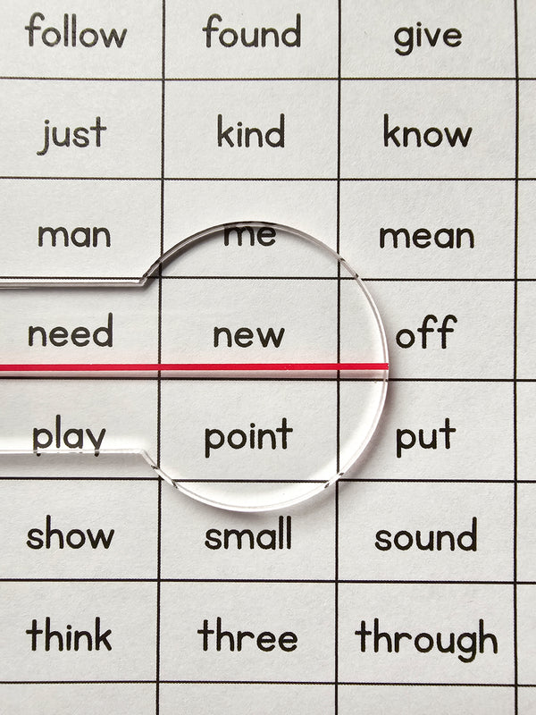 Reading Overlay - Clear Underliner magnifying words on a learning worksheet for better reading focus.